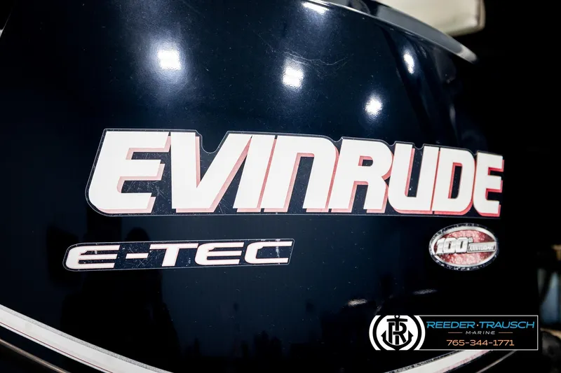 Slide: The Image of Evinrude E-TEC engine on 2004 Smoker Craft 820 Infinity Cruise boat. - 43