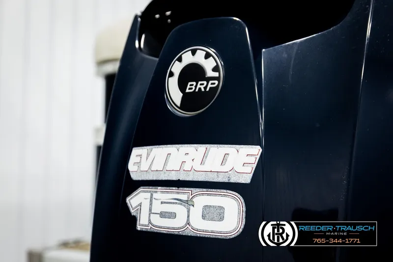 Slide: The Image of Evinrude 150 outboard motor on 2004 Smoker Craft 820 Infinity Cruise boat. - 44