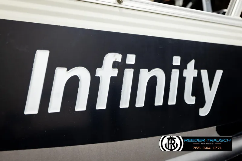 Slide: The Image of Smoker Craft 820 Infinity Cruise 2004 boat logo with Reeder-Trausch Marine branding. - 48