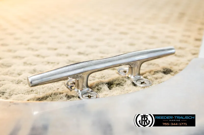 Slide: The Image of Stainless steel cleat on 2004 Smoker Craft 820 Infinity Cruise boat deck. - 49