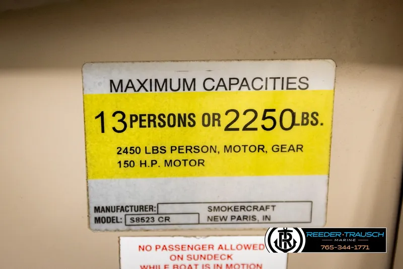 Slide: The Image of 2004 Smoker Craft 820 Infinity Cruise capacity label: 13 persons or 2250 lbs, 150 HP motor. - 50