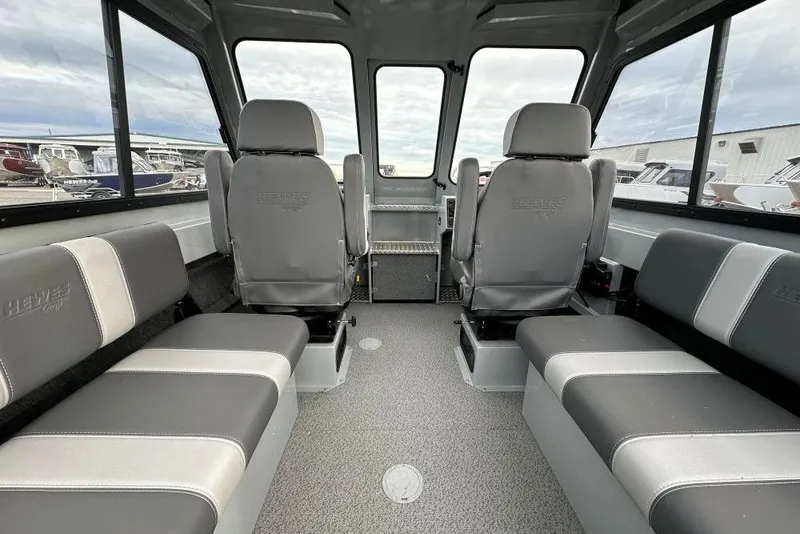 Slide: The Image of Interior of 2026 Hewescraft 190 Sea Runner Hardtop, featuring spacious seating and modern design. - 6