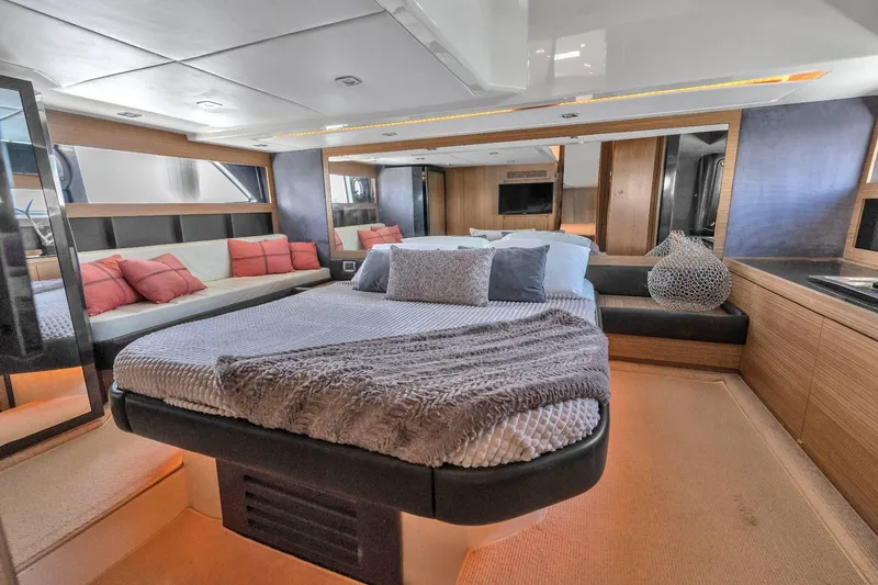 Slide: The Image of Luxurious interior of 2014 Azimut Atlantis 48 yacht with cozy bedding and modern decor. - 14