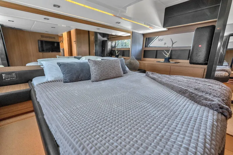 Slide: The Image of Luxurious bedroom interior of 2014 Azimut Atlantis 48 yacht with modern decor. - 16