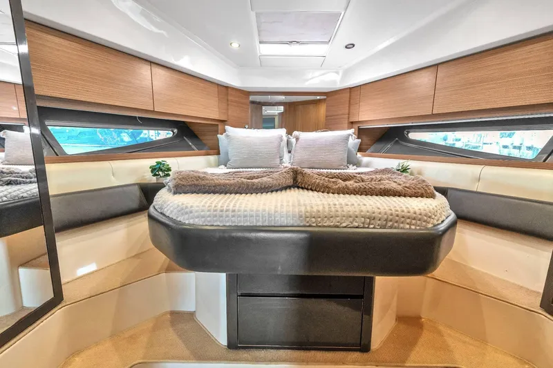 Slide: The Image of Luxurious interior of 2014 Azimut Atlantis 48 yacht with cozy bedding and modern design. - 18