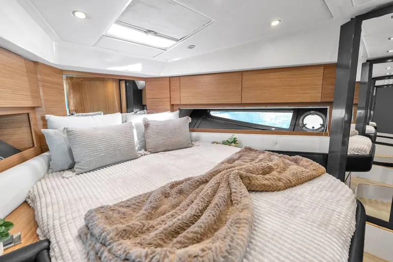 Slide: The Image of Luxurious bedroom interior of 2014 Azimut Atlantis 48 yacht with cozy bedding and modern design. - 19