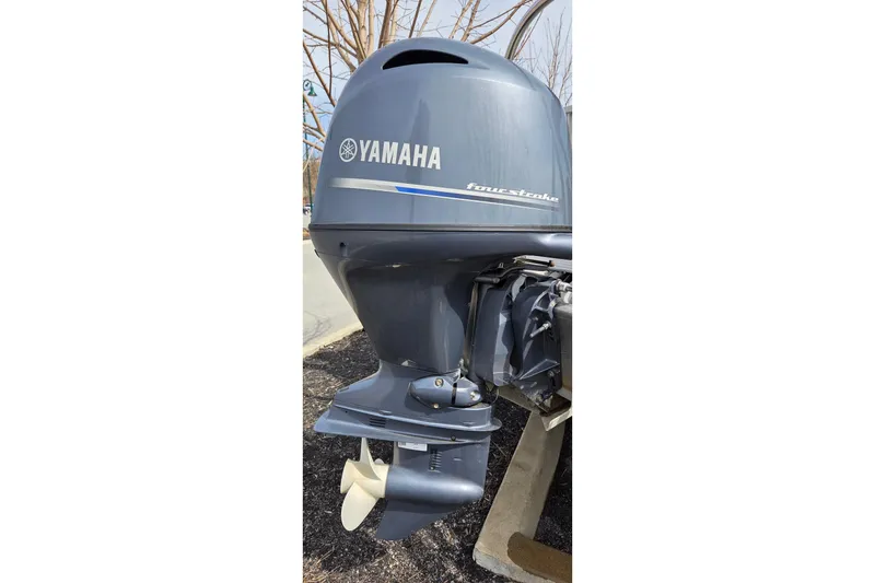 Slide: The Image of Yamaha four-stroke outboard motor on a 2018 Bennington SX22 boat. - 3