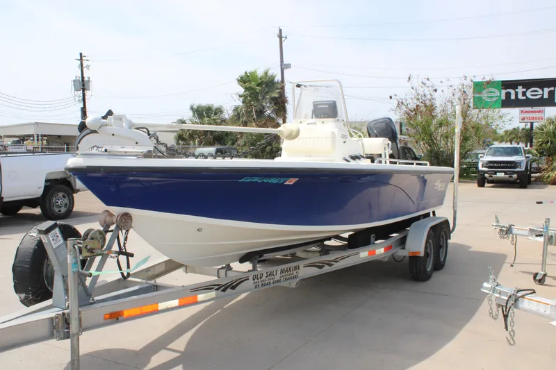Slide: The Image of 2008 Mako 2201 Tunnel Inshore boat on trailer, parked outdoors. - 4