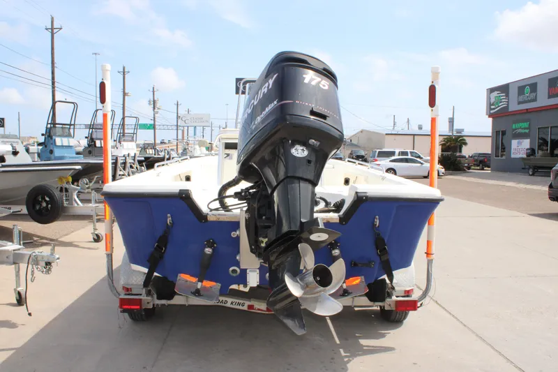 Slide: The Image of 2008 Mako 2201 Tunnel Inshore boat with Mercury 175 engine, parked on trailer. - 7
