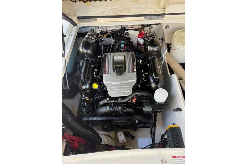 Slide: The Image of Engine compartment of a 2011 Sea Ray 220 Sundeck boat. - 3