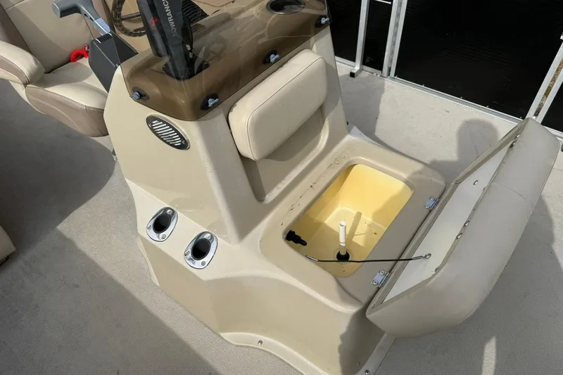 Slide: The Image of 2016 SilverWave 230 Island CC boat console with open storage compartment. - 5