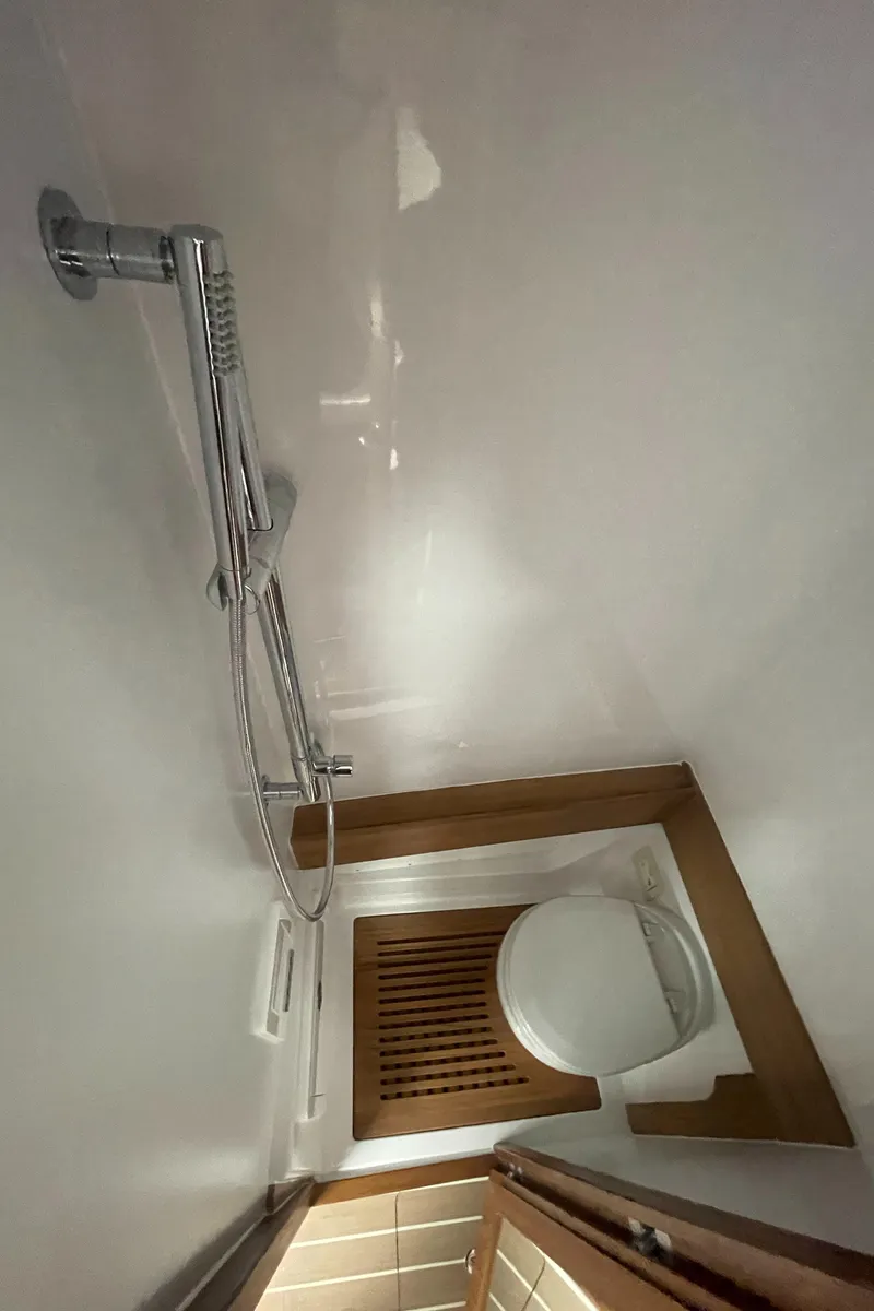 Slide: The Image of Modern bathroom in 2023 Jupiter 40 boat with shower and toilet. - 24