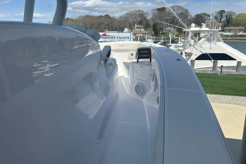 Slide: The Image of 2023 Jupiter 40 yacht docked at marina under clear sky. - 43