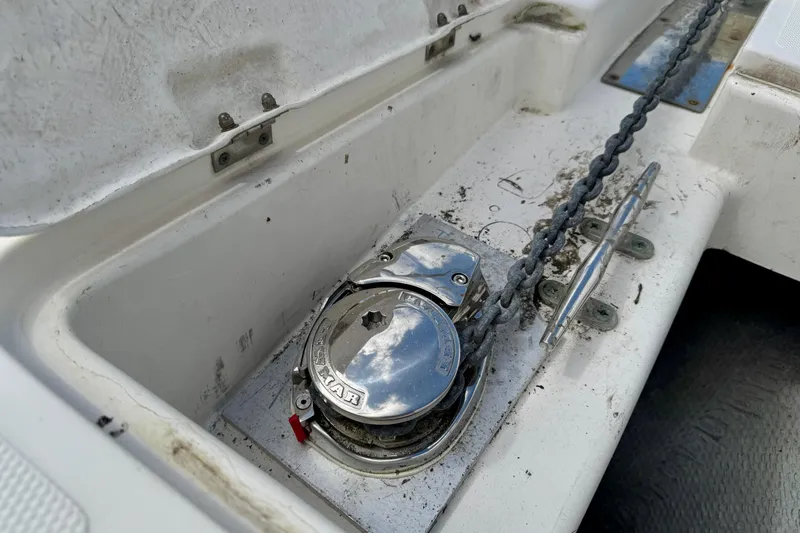 Slide: The Image of Anchor chain and winch on a 2000 Silverton 322 Motor Yacht deck. - 20