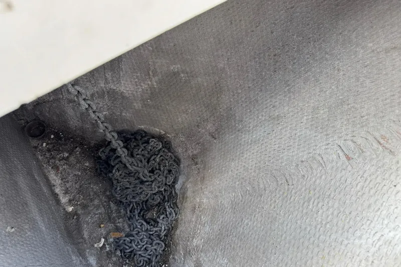 Slide: The Image of Anchor chain in the hull of a 2000 Silverton 322 Motor Yacht. - 21