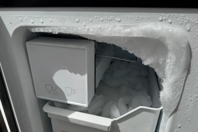 Slide: The Image of Ice maker with frost buildup in a Silverton 322 Motor Yacht, 2000 model. - 9