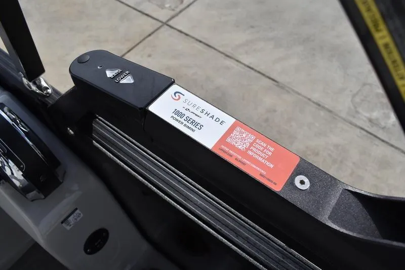 Slide: The Image of SureShade 1000 Series power bimini on 2026 Lowe SS 210 boat. - 14