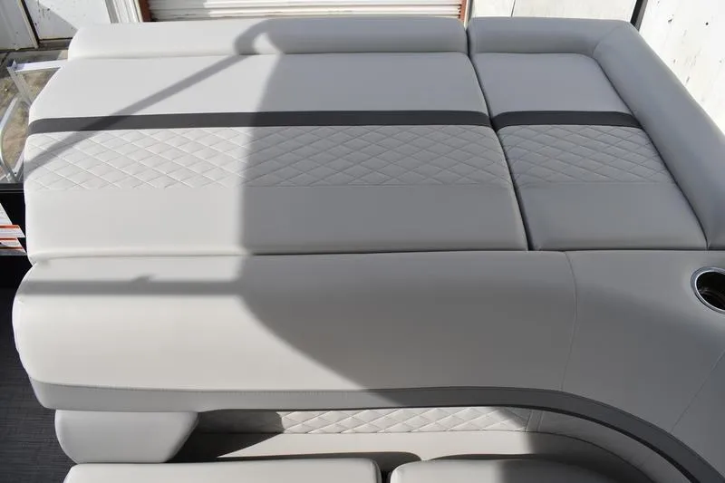 Slide: The Image of Luxurious seating on 2026 Lowe SS 210 boat with quilted upholstery design. - 16
