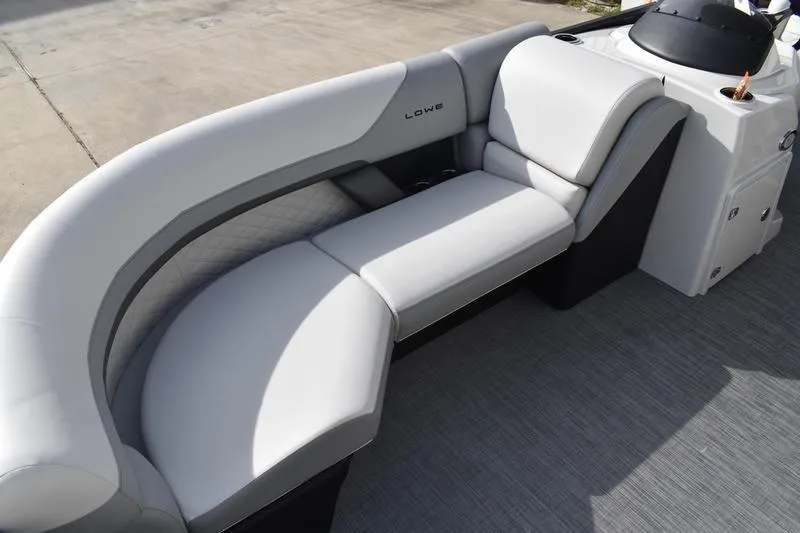 Slide: The Image of 2026 Lowe SS 210 boat interior with sleek, modern seating design. - 5