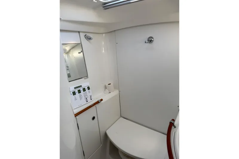 Slide: The Image of Bathroom interior of 2001 Beneteau 393 yacht, featuring a compact and functional design. - 10