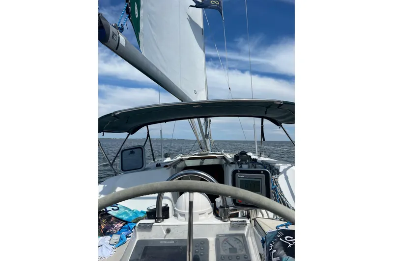 Slide: The Image of Sailing view from a 2001 Beneteau 393 yacht, open sea and clear skies. - 3