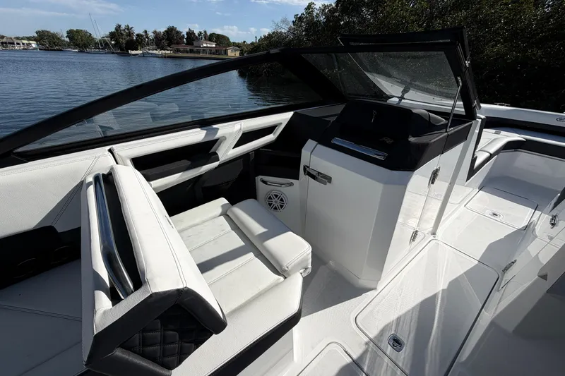Slide: The Image of Luxurious interior of 2026 Cobalt R8 Outboard boat with sleek seating and modern design. - 11