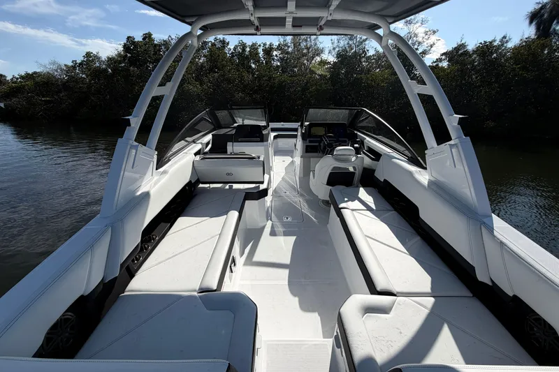 Slide: The Image of 2026 Cobalt R8 Outboard boat interior with sleek white seating and modern design. - 14