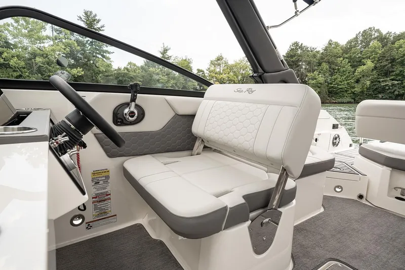 Slide: The Image of Manufacturer Provided Image: 2023 Sea Ray SDX 250 boat interior with white and gray seating. - 10