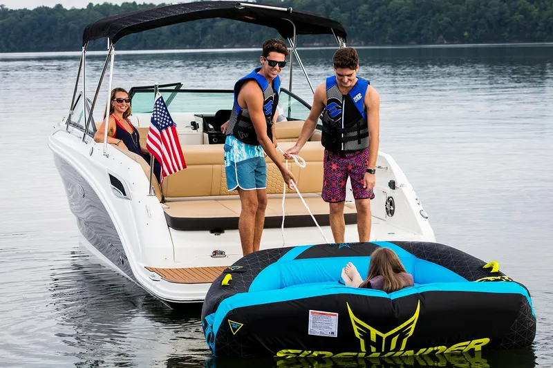 Slide: The Image of Manufacturer Provided Image: People enjoying water activities on a 2023 Sea Ray SDX 250 boat. - 3