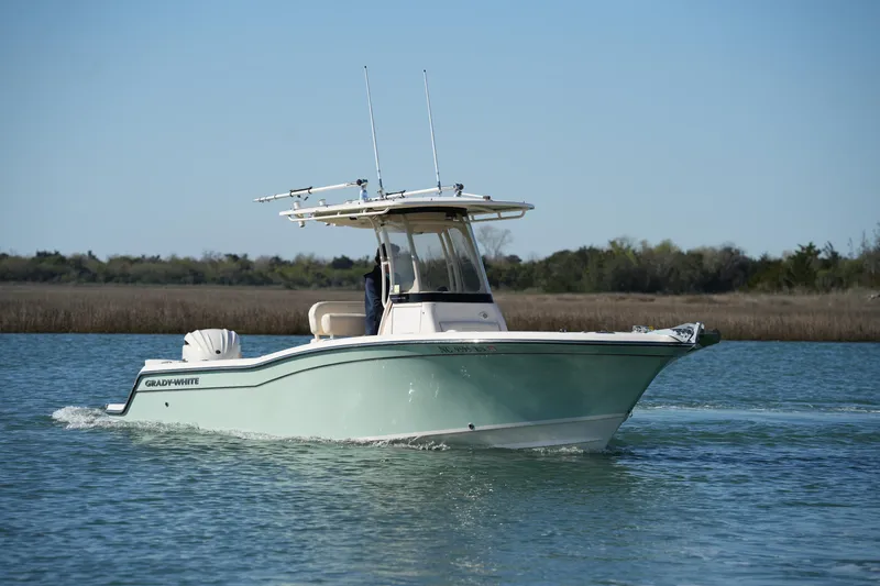 The Image of 2021 Grady-White Fisherman 236 boat cruising on calm water. - 0