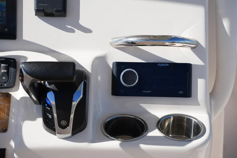 Slide: The Image of Control panel of 2021 Grady-White Fisherman 236 boat with Fusion stereo system. - 19