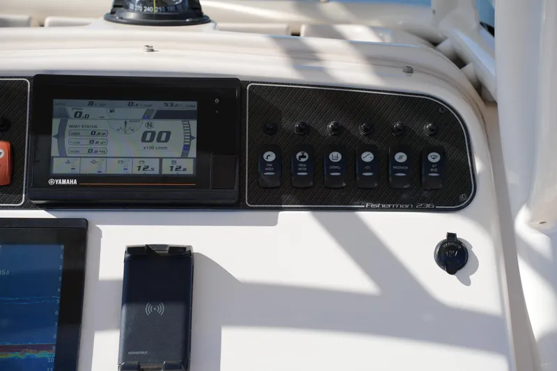 Slide: The Image of Dashboard of 2021 Grady-White Fisherman 236 boat with Yamaha display and control switches. - 20