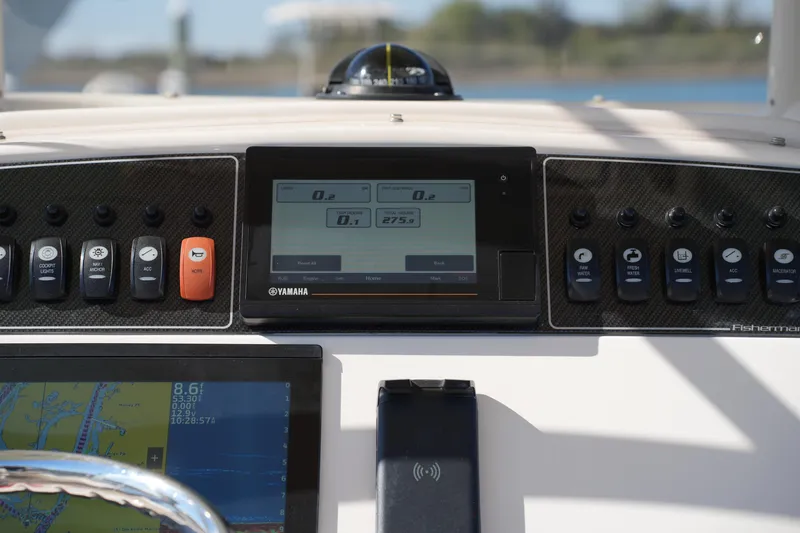 Slide: The Image of Control panel of a 2021 Grady-White Fisherman 236 boat with Yamaha display. - 23