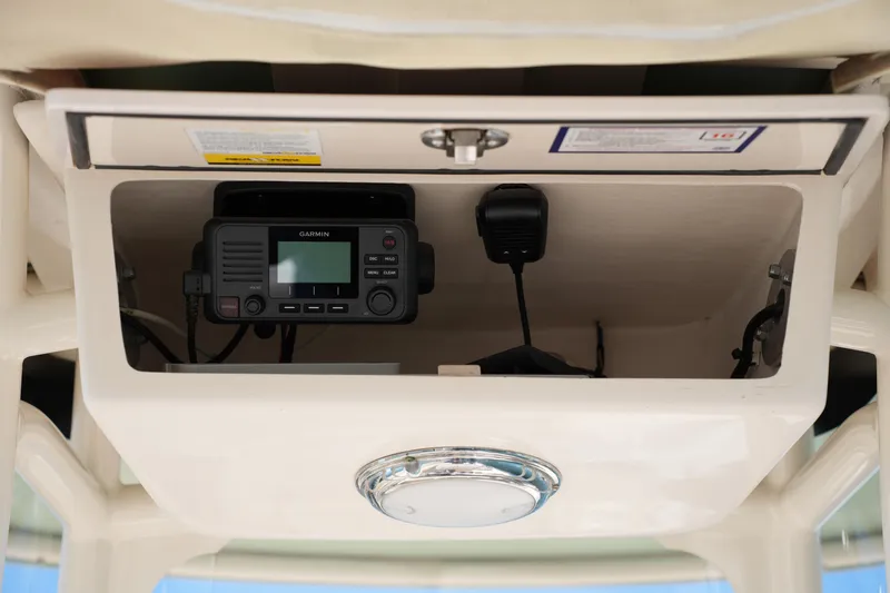 Slide: The Image of 2021 Grady-White Fisherman 236 boat console with Garmin marine radio. - 25