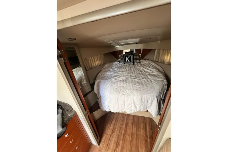 Slide: The Image of Interior cabin of 2006 Formula 40 Performance Cruiser with cozy bed and wooden flooring. - 19