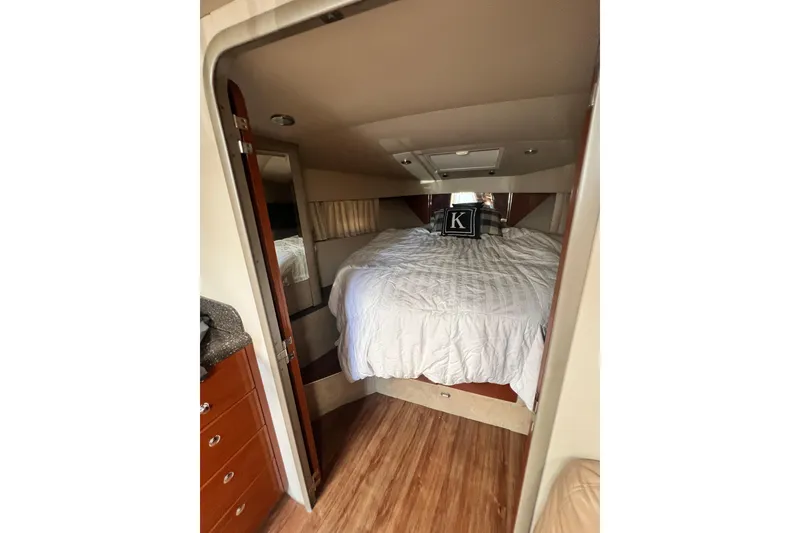 Slide: The Image of Interior cabin of 2006 Formula 40 Performance Cruiser with cozy bed and wooden flooring. - 20