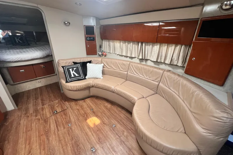Slide: The Image of Luxurious interior of a 2006 Formula 40 Performance Cruiser with leather seating and wood accents. - 26