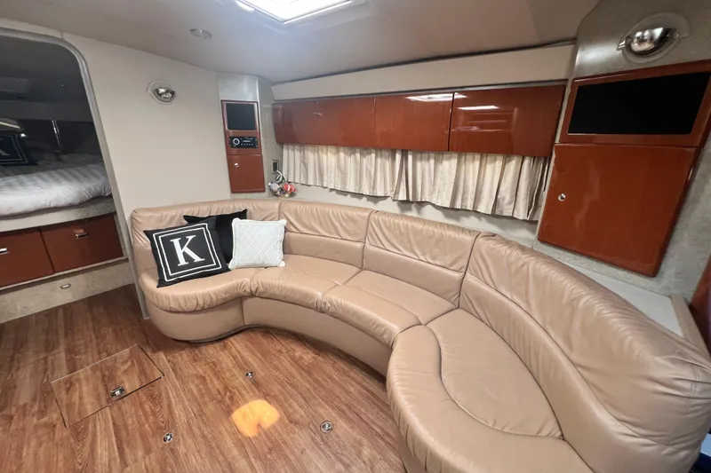 Slide: The Image of Luxurious interior of a 2006 Formula 40 Performance Cruiser with leather seating and wood accents. - 27