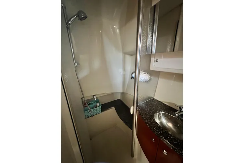 Slide: The Image of 2006 Formula 40 Performance Cruiser bathroom with shower and sink. - 32