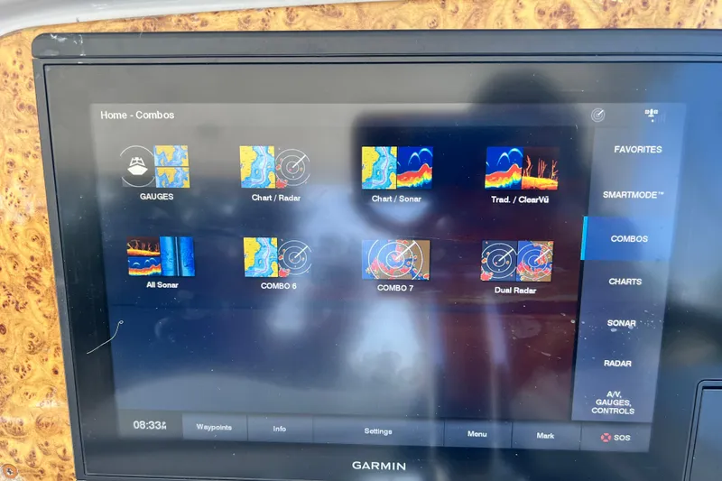 Slide: The Image of Garmin marine display on 2006 Formula 40 Performance Cruiser showing navigation and sonar options. - 36