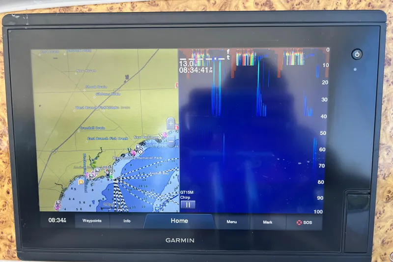 Slide: The Image of Garmin marine GPS display on 2006 Formula 40 Performance Cruiser, showing navigation and sonar data. - 37