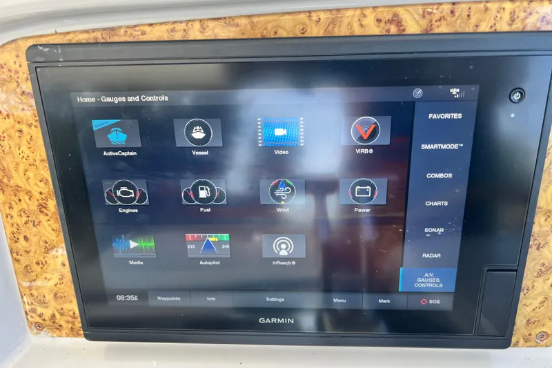 Slide: The Image of Garmin display on 2006 Formula 40 Performance Cruiser showing gauges and controls interface. - 38