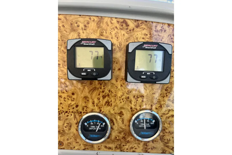 Slide: The Image of Dashboard of a 2006 Formula 40 Performance Cruiser with Mercury SmartCraft displays. - 39