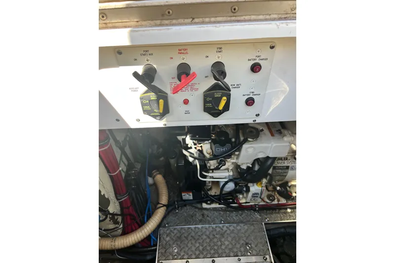 Slide: The Image of Control panel and engine of a 2006 Formula 40 Performance Cruiser boat. - 41