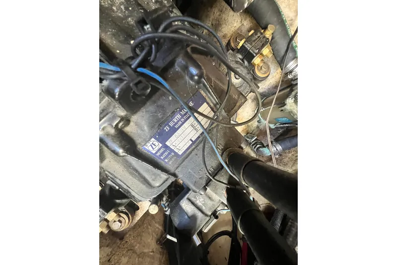 Slide: The Image of Engine compartment of a 2006 Formula 40 Performance Cruiser with visible wiring and components. - 45