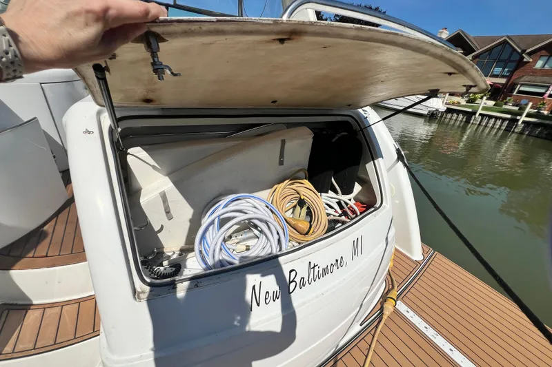 Slide: The Image of 2006 Formula 40 Performance Cruiser storage compartment with cables, docked in New Baltimore, MI. - 49
