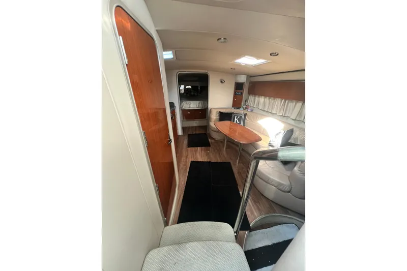 Slide: The Image of Interior of 2006 Formula 40 Performance Cruiser with wood accents and cozy seating area. - 54