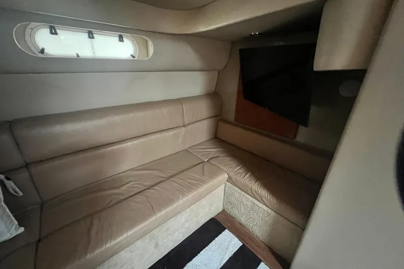 Slide: The Image of Interior of 2006 Formula 40 Performance Cruiser with beige leather seating and window. - 60