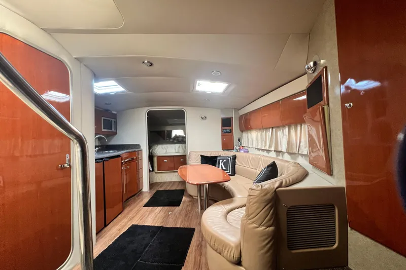 Slide: The Image of Interior of a 2006 Formula 40 Performance Cruiser with modern amenities and cozy seating. - 61