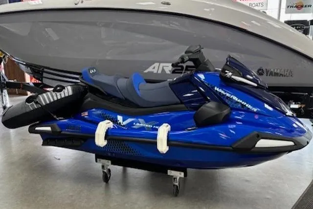 The Image of 2026 Yamaha WaveRunner VX Limited HO in blue, displayed indoors on a stand. - 0